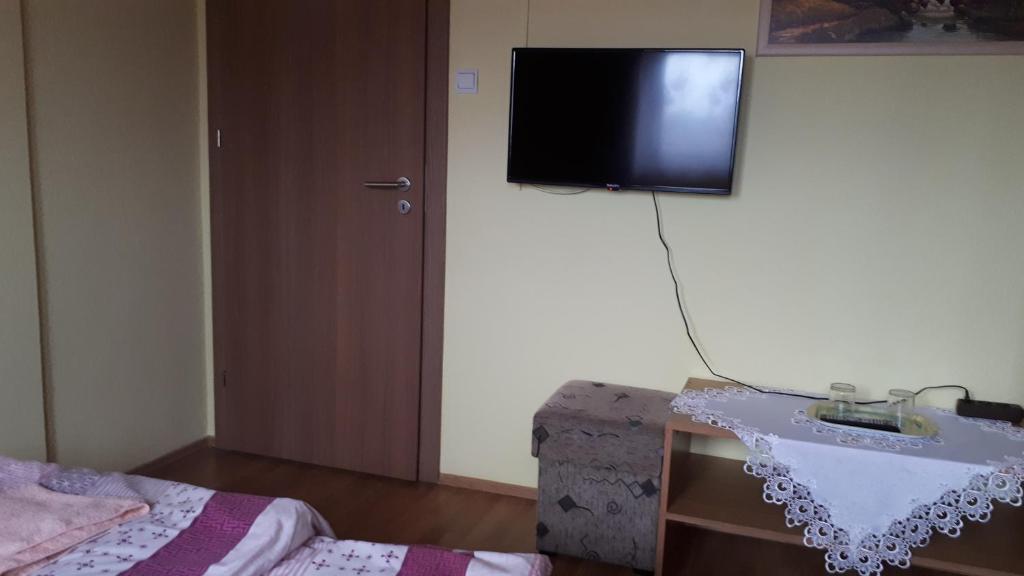 Postel nebo postele na pokoji v ubytování Napsugár Panzió