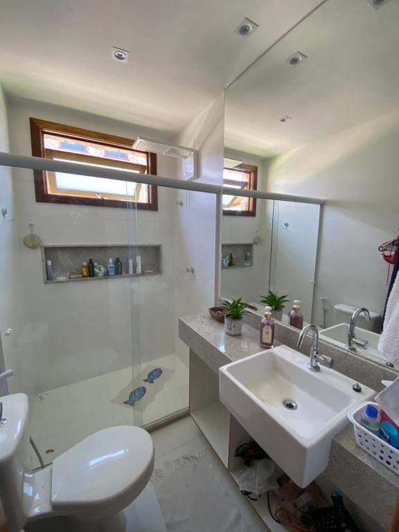 Ένα μπάνιο στο Apartamento em barra grande - Villaggio di Mare - apto 02 bl 04 - Garden