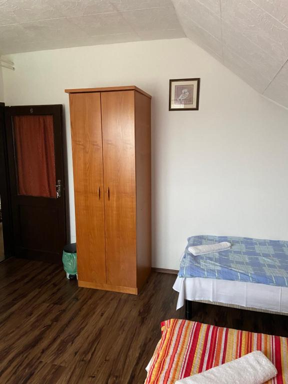 Postel nebo postele na pokoji v ubytování Teke Panzió