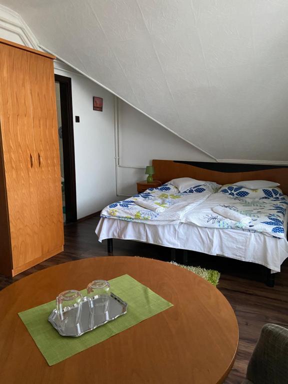 Postel nebo postele na pokoji v ubytování Teke Panzió