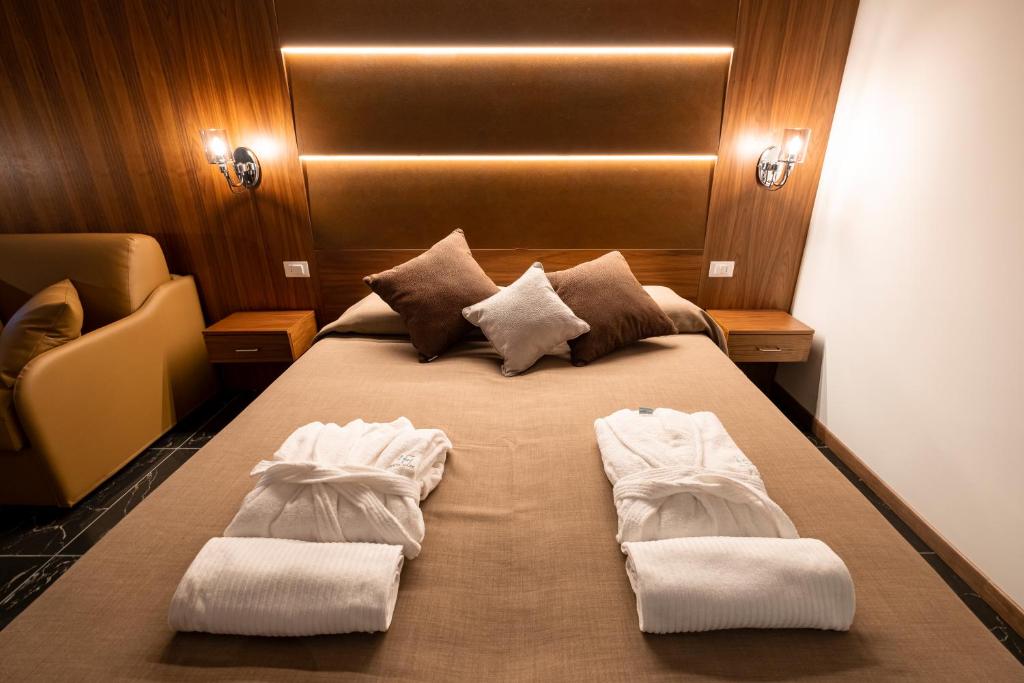 Postel nebo postele na pokoji v ubytování Hotel Mare