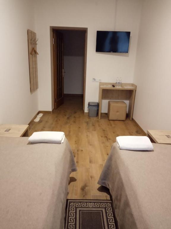 Postel nebo postele na pokoji v ubytování Hotel Bonus