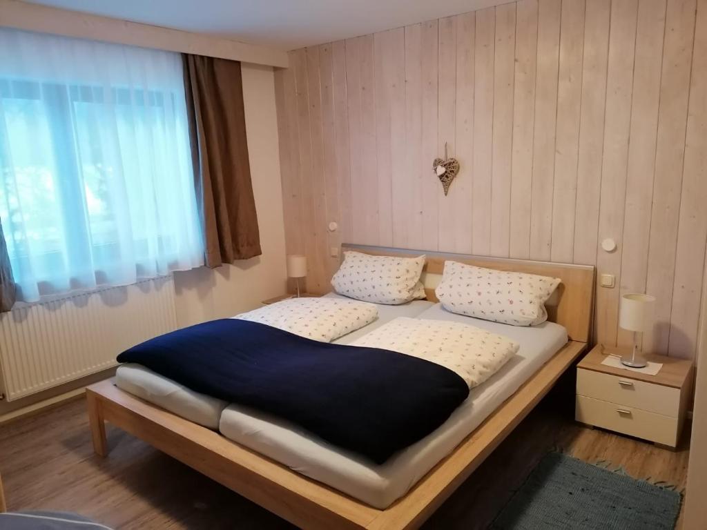 Postel nebo postele na pokoji v ubytování Gästehaus Pöppl