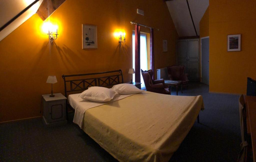 Postel nebo postele na pokoji v ubytování Hotel In Den Hoek