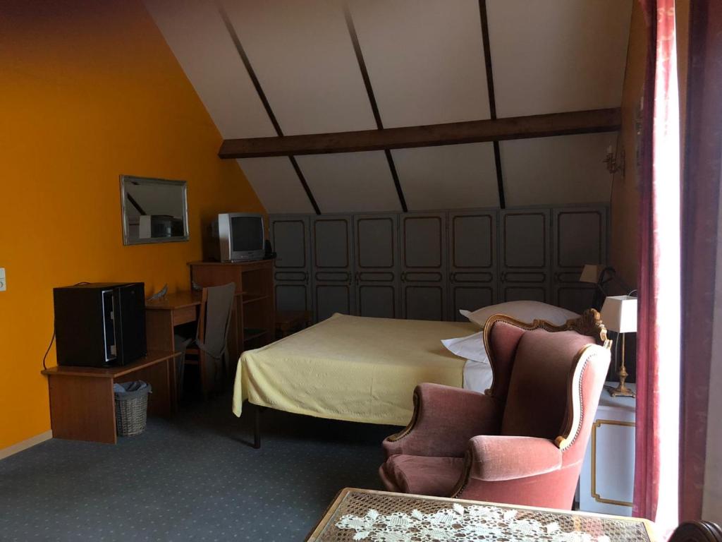 TV a/nebo společenská místnost v ubytování Hotel In Den Hoek