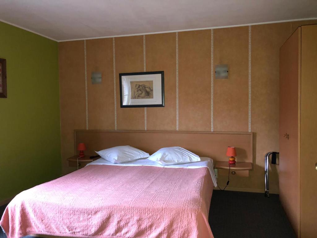 Postel nebo postele na pokoji v ubytování Hotel In Den Hoek