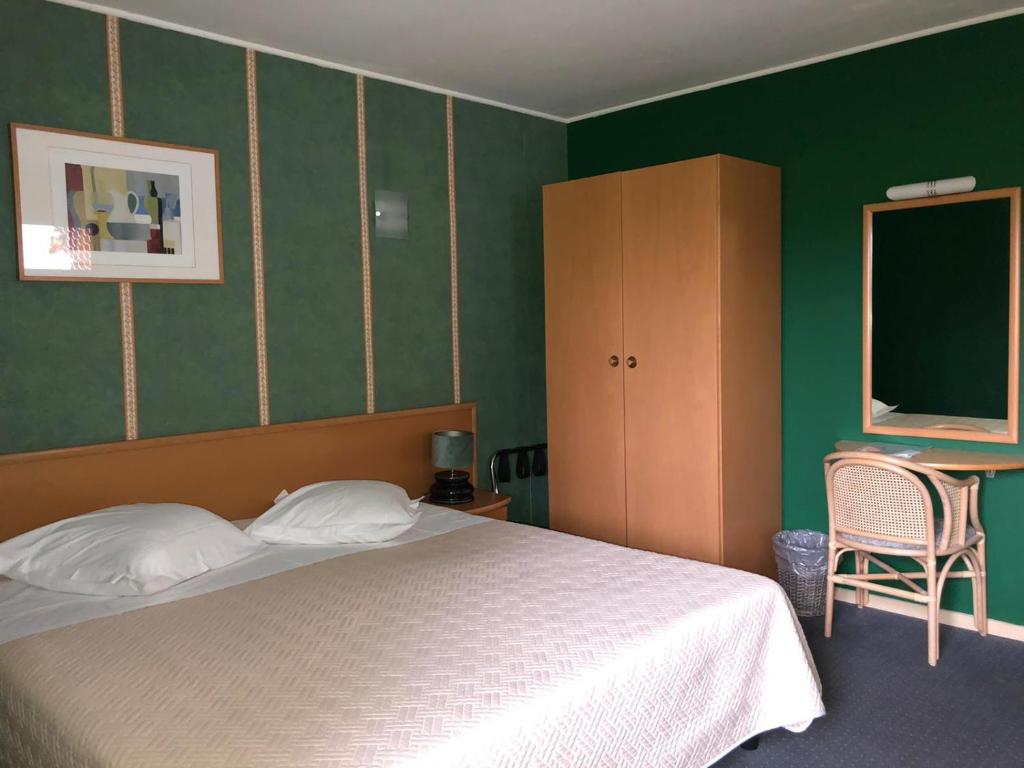 Postel nebo postele na pokoji v ubytování Hotel In Den Hoek