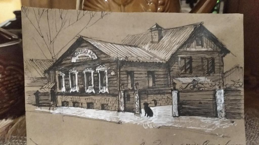 a drawing of a house with a black cat at House Liteyschika Nikulicheva with Banya in Suzdal