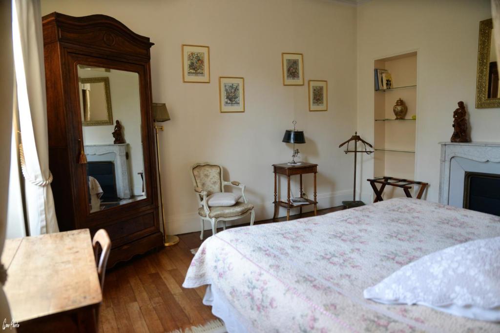 Postel nebo postele na pokoji v ubytování L'Oustal