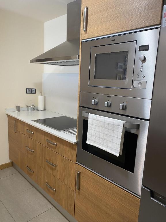 A kitchen or kitchenette at Apartament Neret I