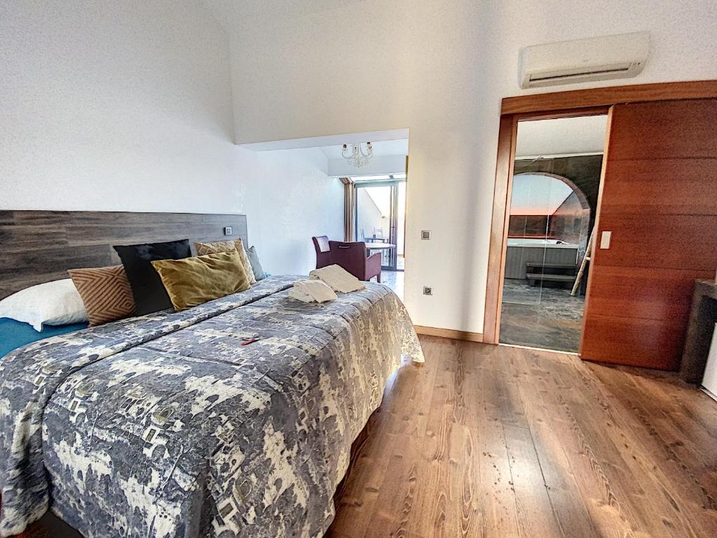 Postel nebo postele na pokoji v ubytování Monte Do Malhao - Art, Eco & Spa