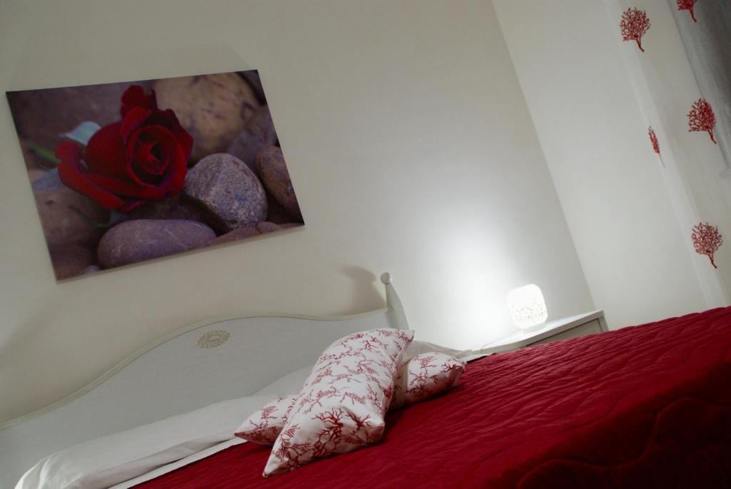 Postel nebo postele na pokoji v ubytování Stella Fenicia