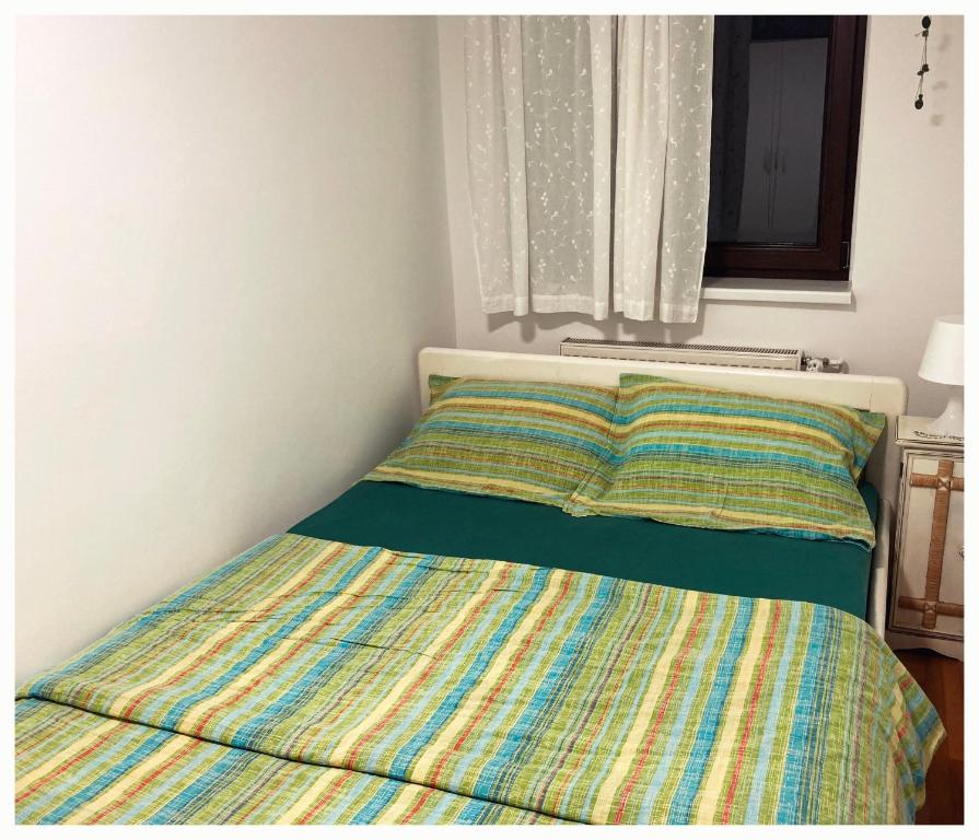 Postel nebo postele na pokoji v ubytování Vila Jelena, Tara