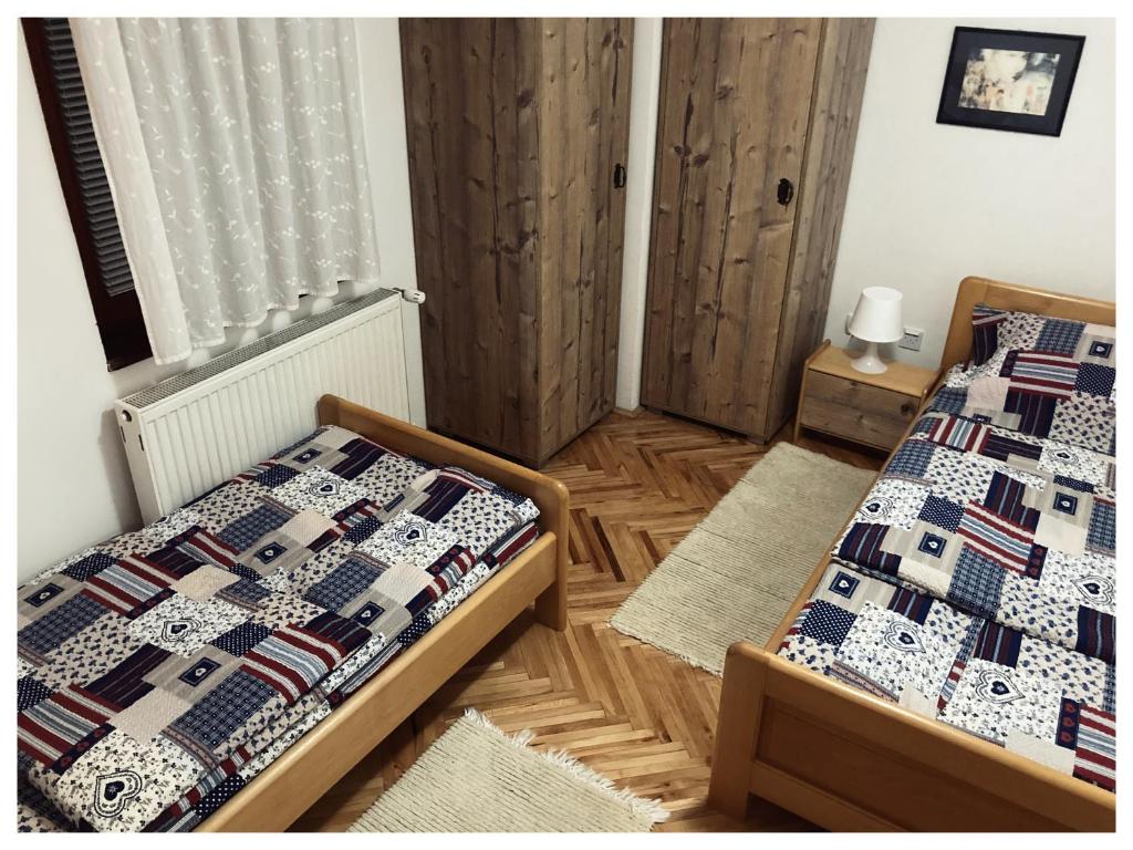 Postel nebo postele na pokoji v ubytování Vila Jelena, Tara