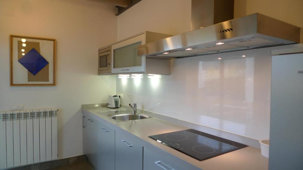 Kuchyň nebo kuchyňský kout v ubytování Las Villas de Cué