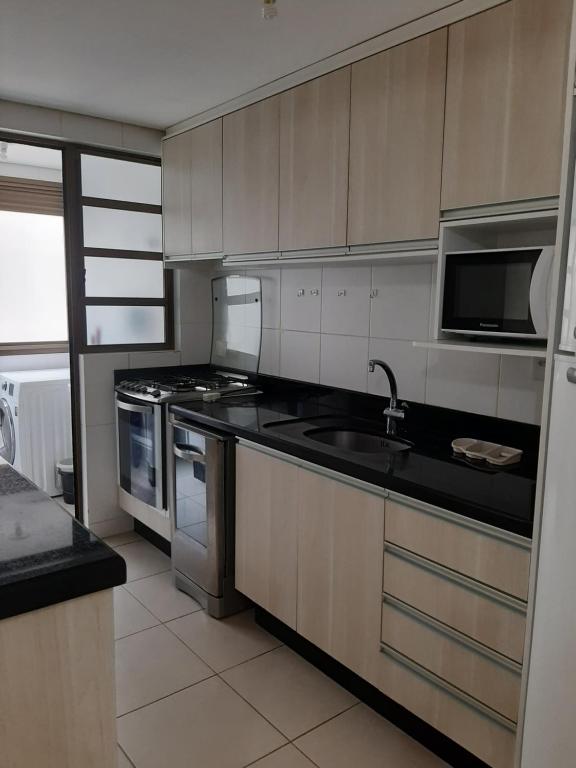  Apartamento em frente a Praia do Campeche.