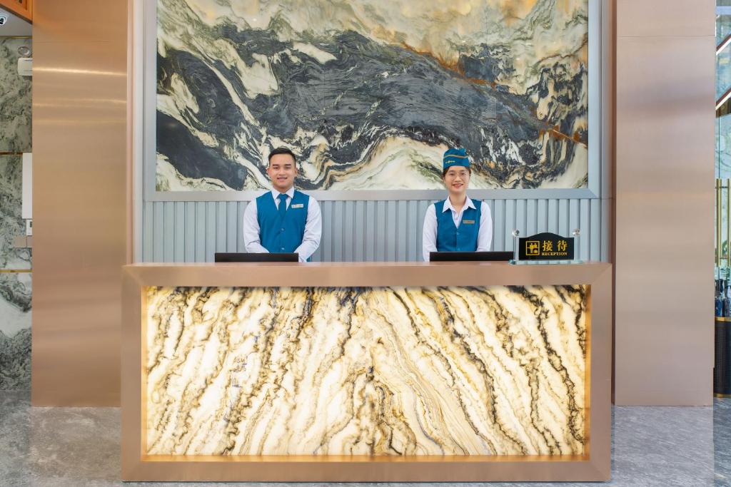 Členové personálu v ubytování Calix Hotel Da Nang Beach