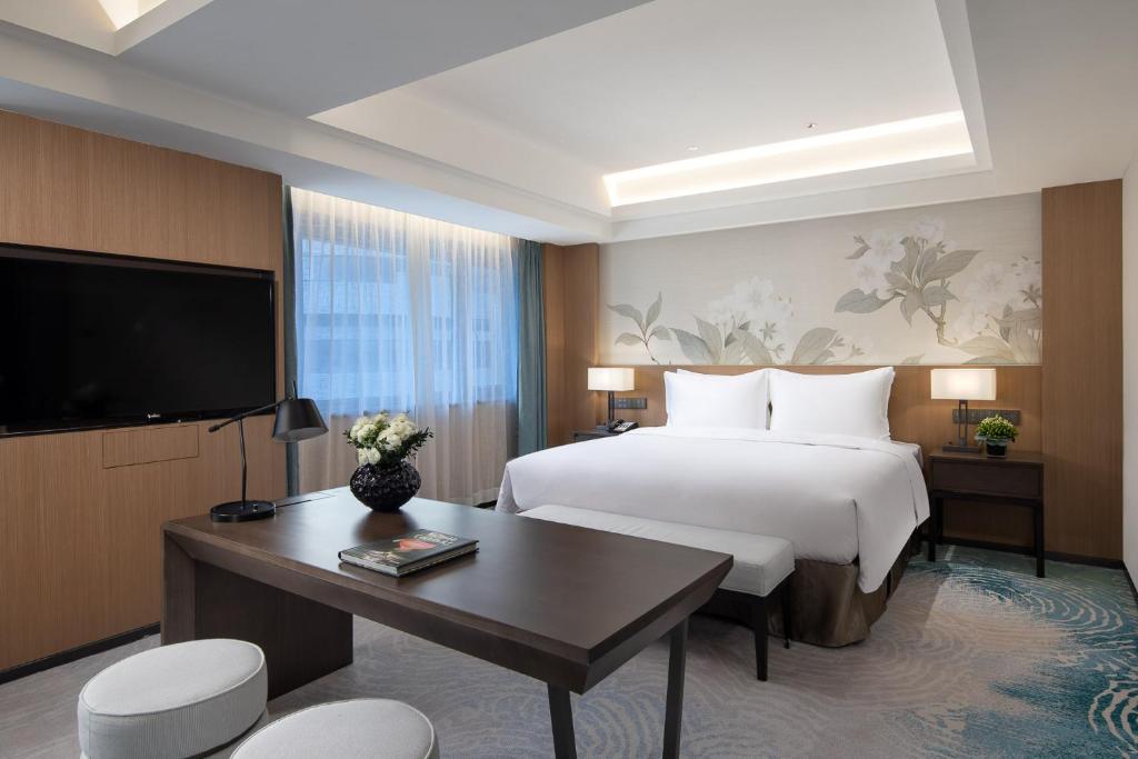 TV a/nebo společenská místnost v ubytování Foreign Trade Centre C&D Hotel,Fuzhou