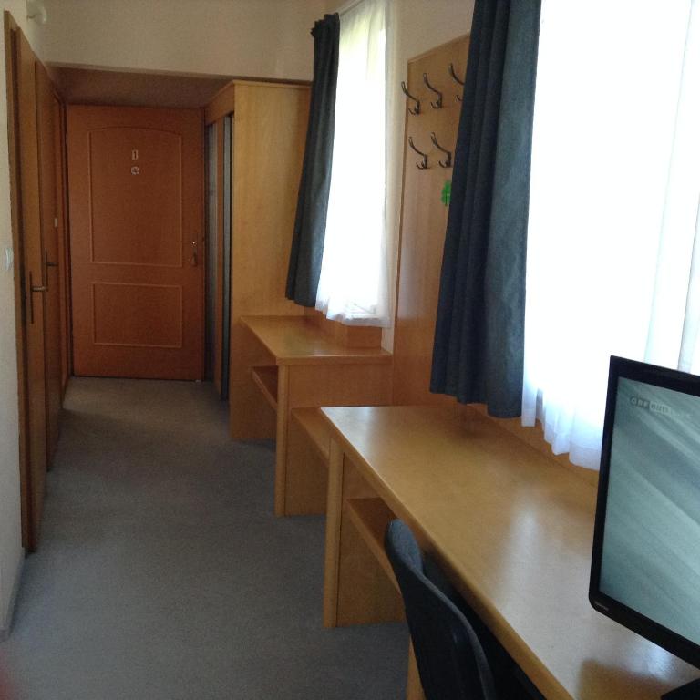 TV a/nebo společenská místnost v ubytování Hotel Zsida
