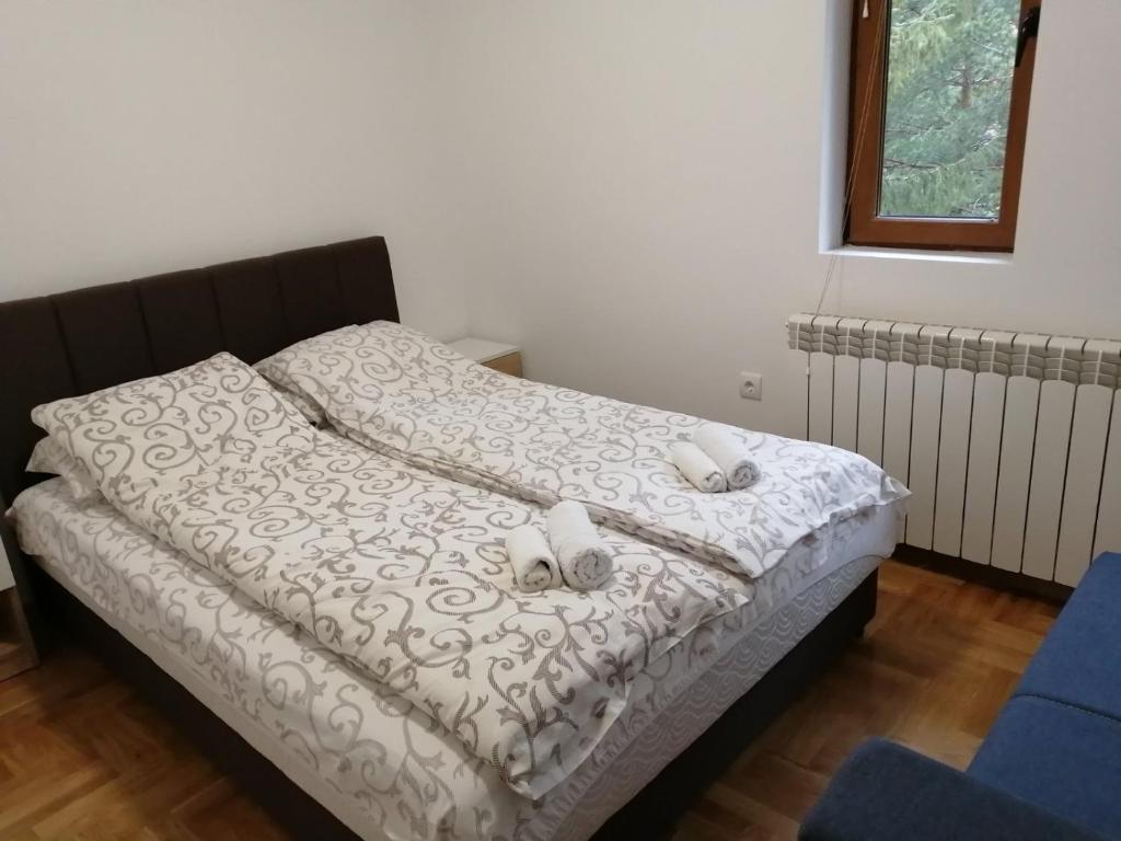 Postel nebo postele na pokoji v ubytování Vila Meridijan