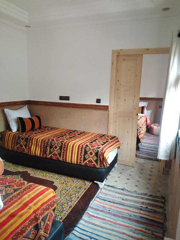 Postel nebo postele na pokoji v ubytování Riad Bab Imlil