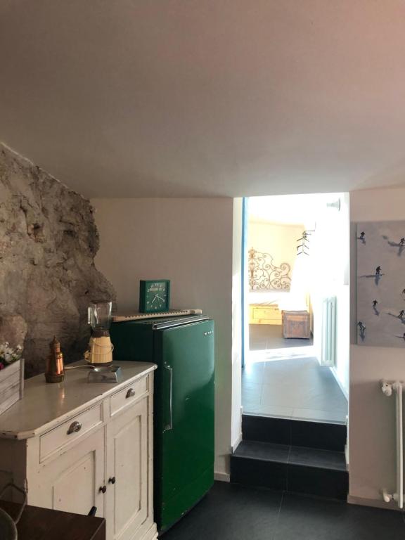 Kuchyň nebo kuchyňský kout v ubytování Il giardino incantato