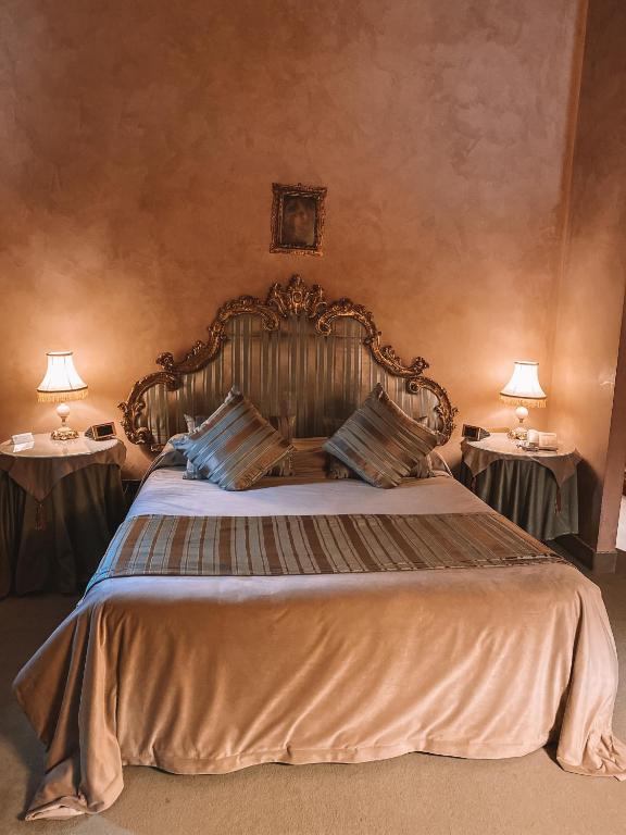 Posteľ alebo postele v izbe v ubytovaní Relais Villabella Hotel