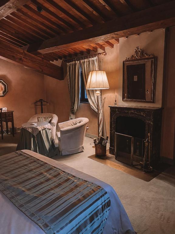 Posteľ alebo postele v izbe v ubytovaní Relais Villabella Hotel