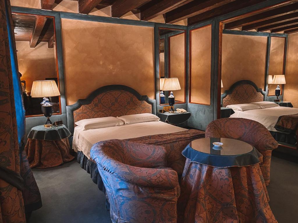 Posteľ alebo postele v izbe v ubytovaní Relais Villabella Hotel