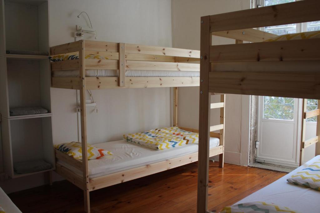 A bed or beds in a room at Jacob's Hotel TUI