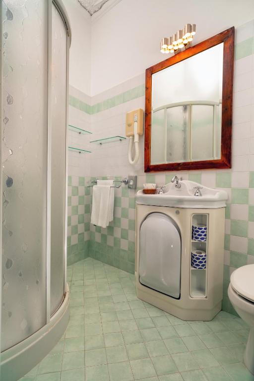 Koupelna v ubytování Hotel Vello d'Oro