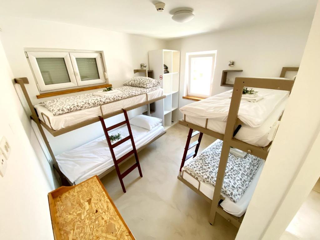 Postel nebo postele na pokoji v ubytování Guest House Via Flavia