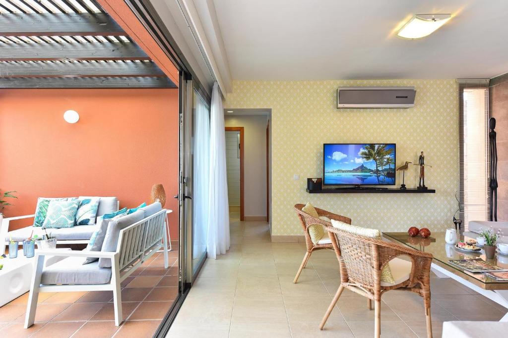 TV a/nebo společenská místnost v ubytování Calypso by VillaGranCanaria