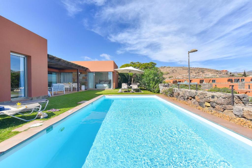 Bazén v ubytování Calypso by VillaGranCanaria nebo v jeho okolí