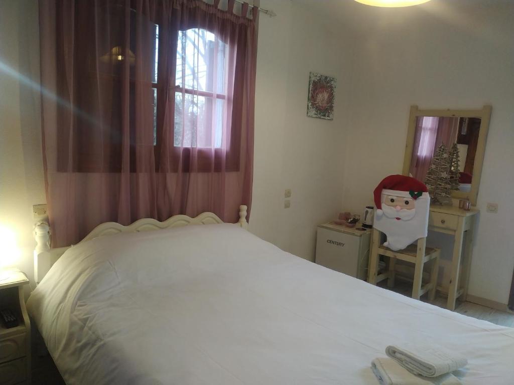 Postel nebo postele na pokoji v ubytování Traditional Cozy Room