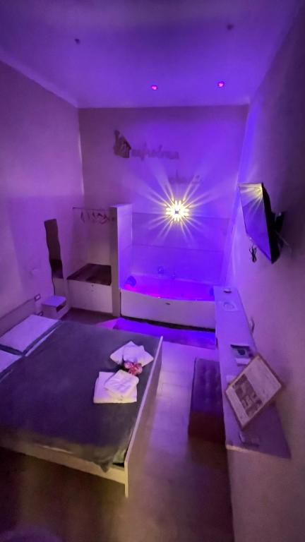 Postel nebo postele na pokoji v ubytování ManfredoniaJacuzzi