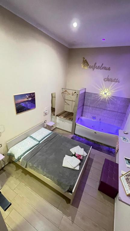 Postel nebo postele na pokoji v ubytování ManfredoniaJacuzzi