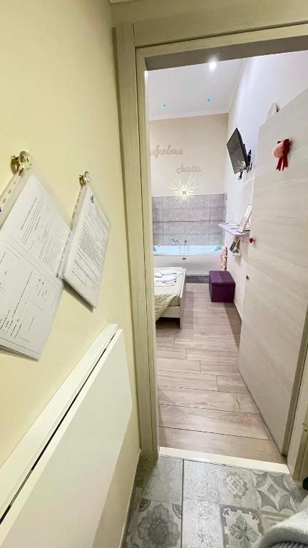 Postel nebo postele na pokoji v ubytování ManfredoniaJacuzzi