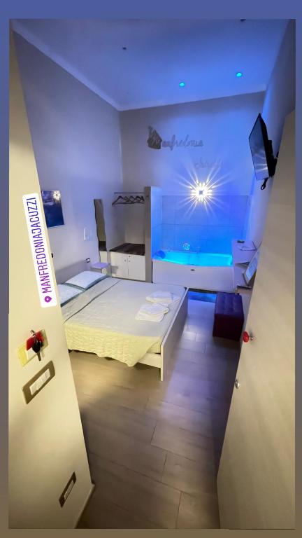 Postel nebo postele na pokoji v ubytování ManfredoniaJacuzzi