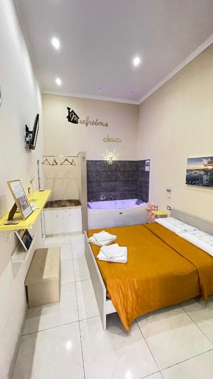 Postel nebo postele na pokoji v ubytování ManfredoniaJacuzzi
