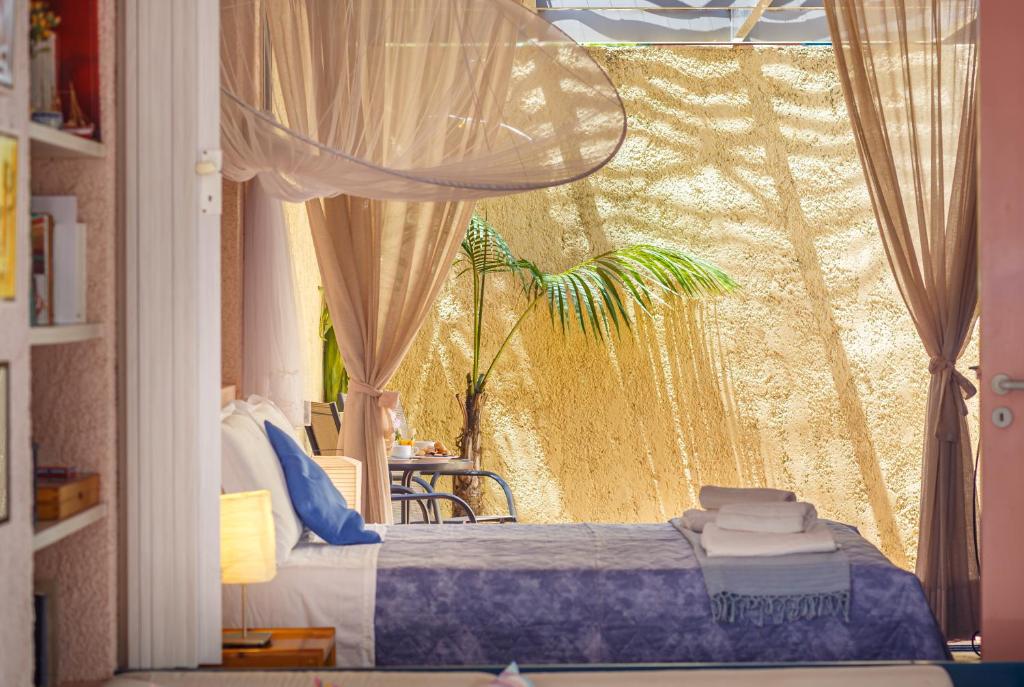 Posteľ alebo postele v izbe v ubytovaní Barbati Beach Art House