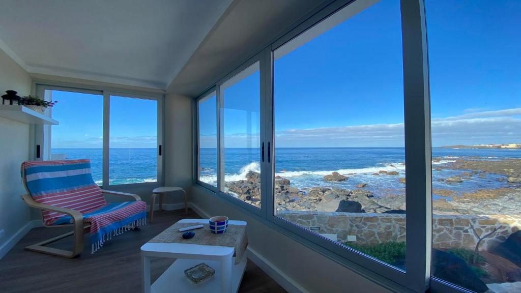 a living room with a view of the ocean at Casa Camilo I in Valle Gran Rey