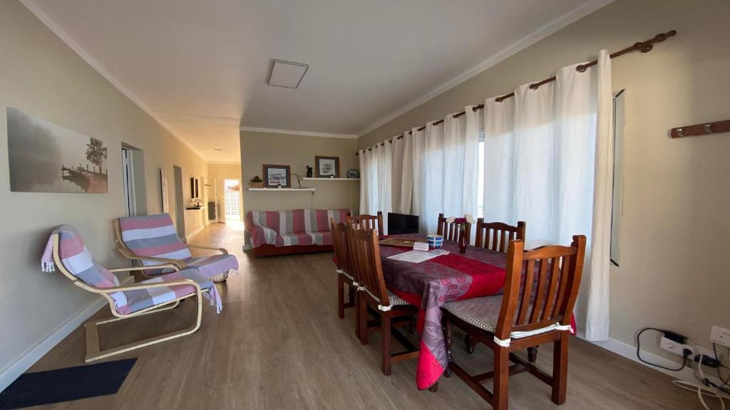 a dining room with a table and chairs and a window at Casa Camilo I in Valle Gran Rey