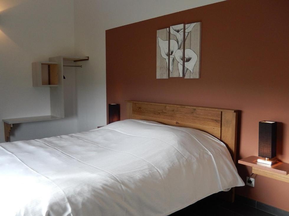 Postel nebo postele na pokoji v ubytování Gîte du Moulin - Rose
