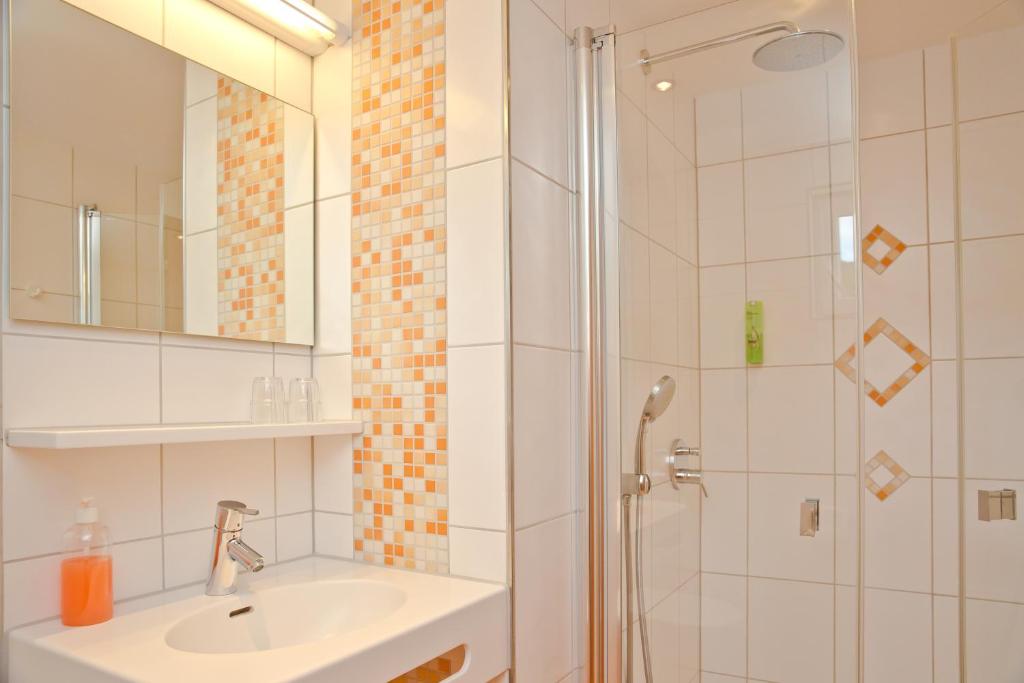 Koupelna v ubytování Gartenhotel Feldeck