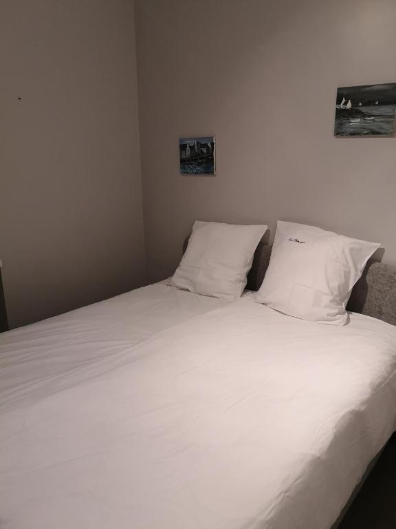 Postel nebo postele na pokoji v ubytování Le Rimamir gîte de charme au bord de l’Amblève