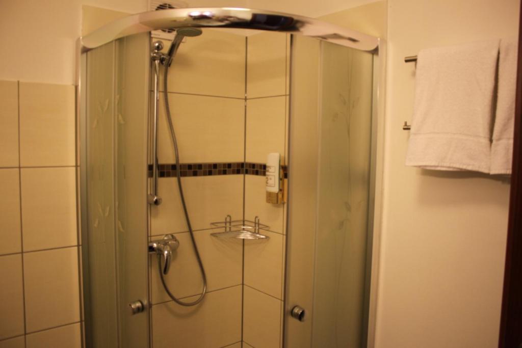 Koupelna v ubytování AS Hotel
