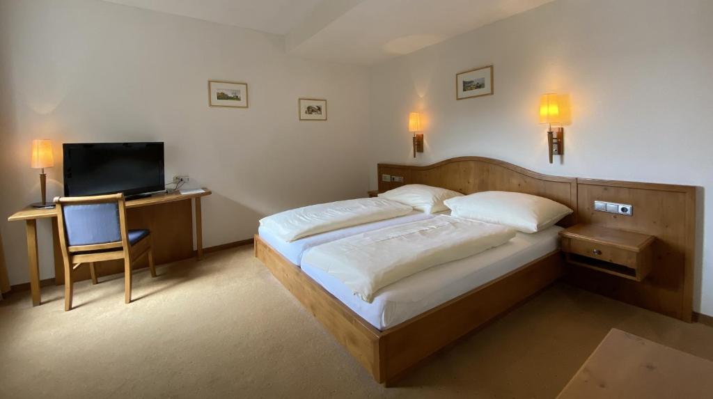 Postel nebo postele na pokoji v ubytování Hotel-Restaurant Faustschlössl