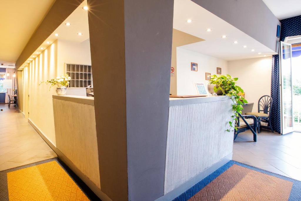 Kuchyň nebo kuchyňský kout v ubytování Hotel Garden