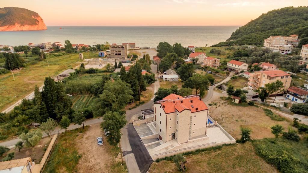 an aerial view of a small town next to the ocean at Luxury Apartments Queen in Petrovac na Moru